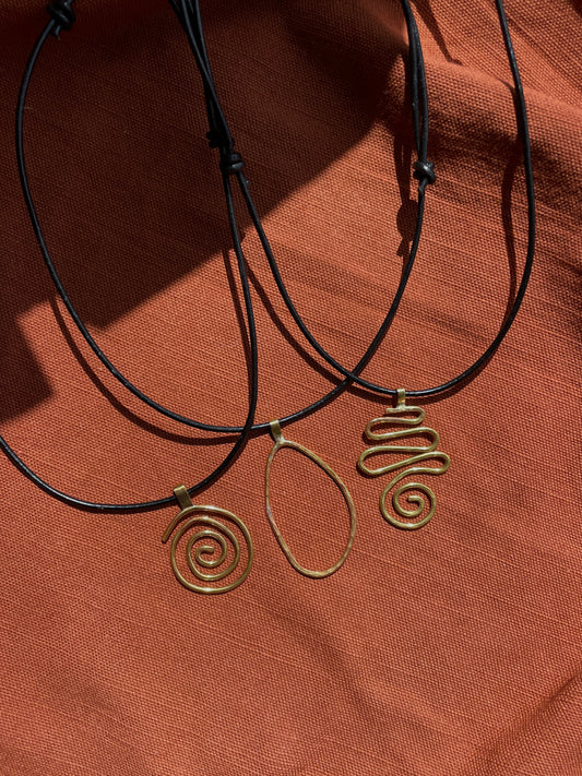 Swirl Girl Brass Pendant