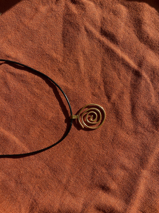 Swirl Girl Brass Pendant